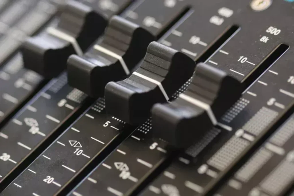 faders on mixing desk